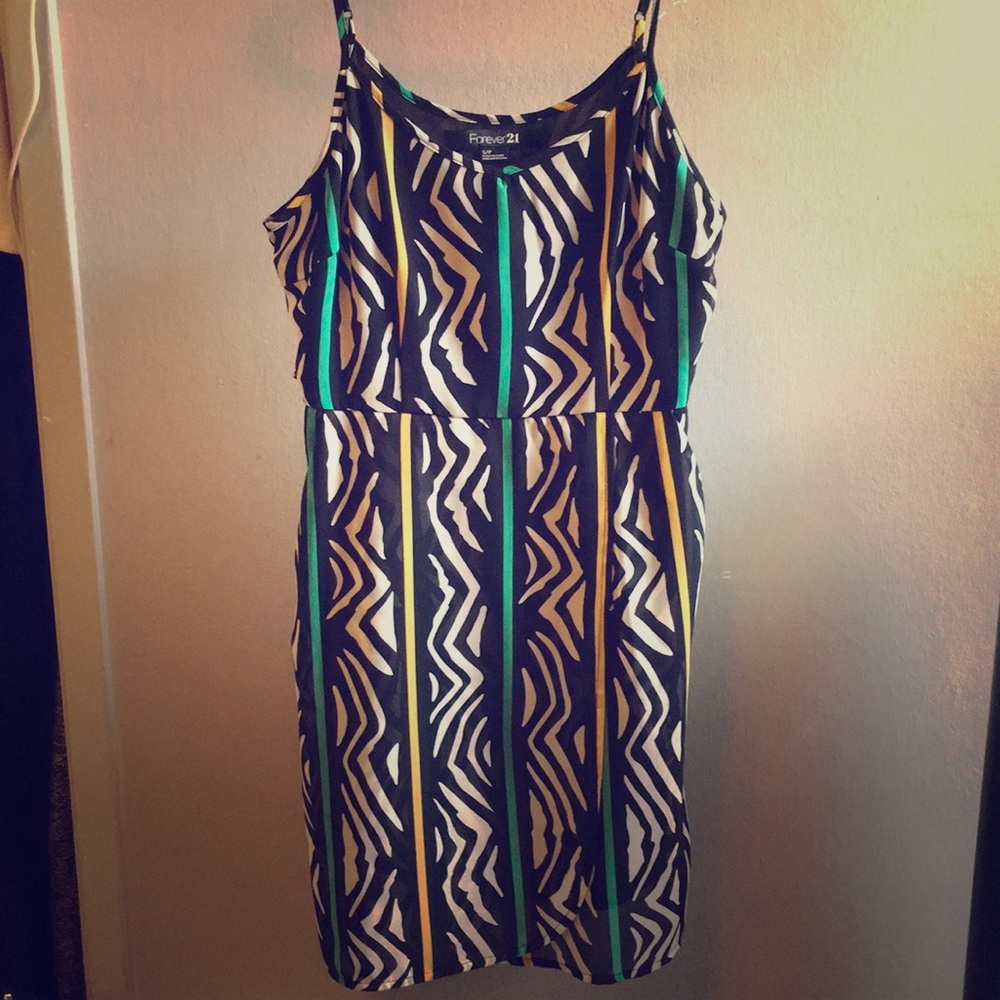 Dress with pockets. Spaghetti strap.